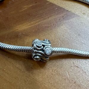 Pandora Retired “Ocean Wave” Charm Bead with clear CZ’s